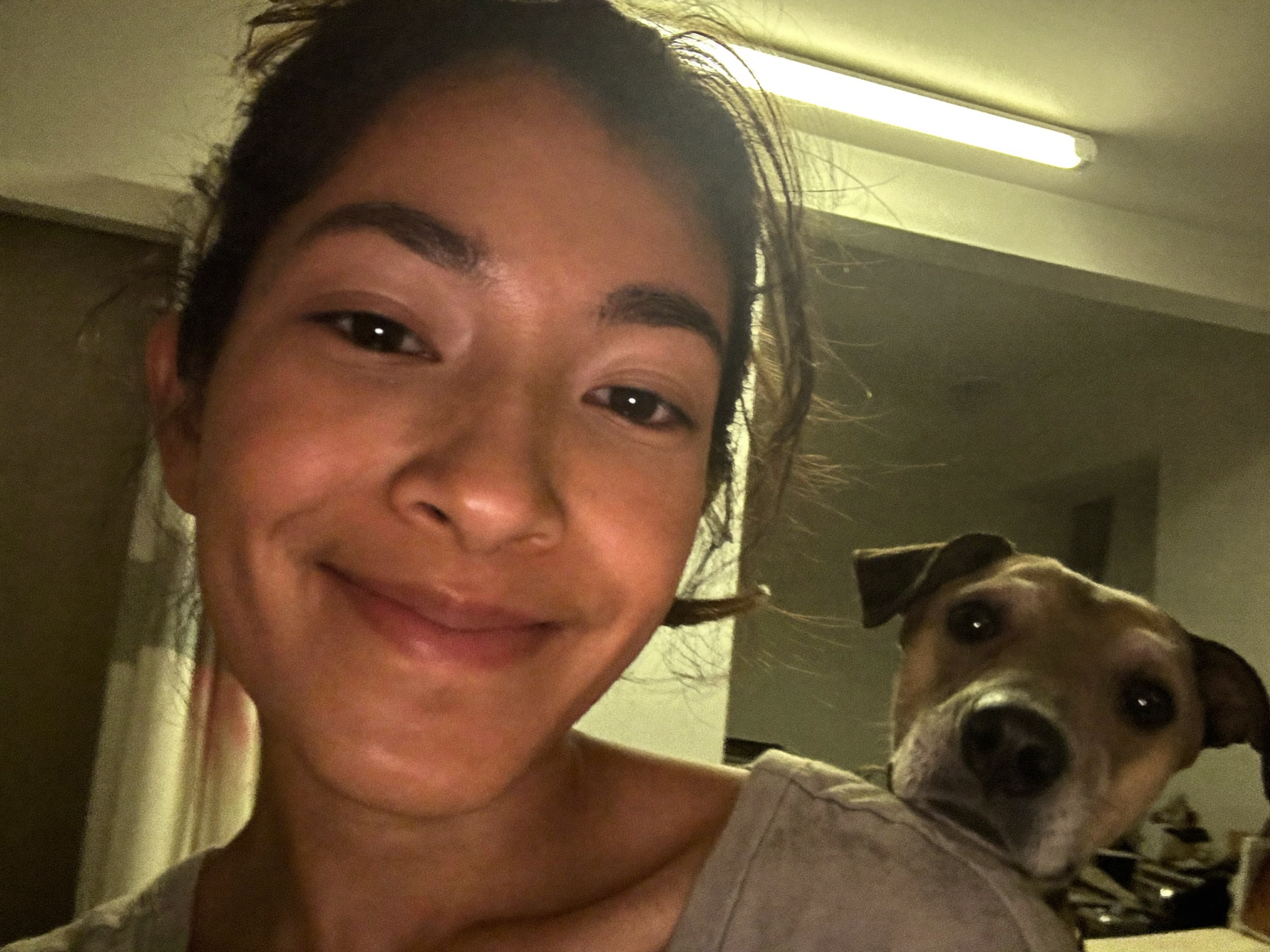 Priya S. with her Indie dog
